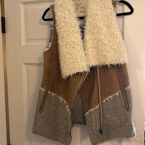Trendy, suede and sherpa vest